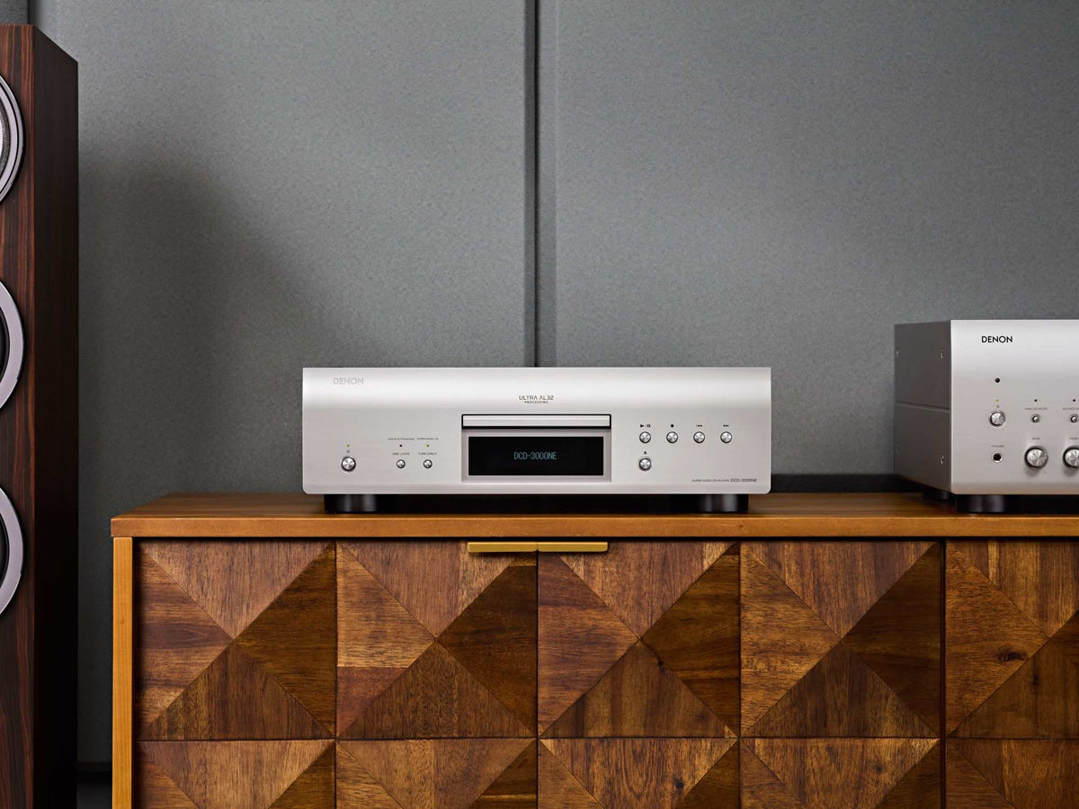 Denon DCD-3000NE CD/SACD player: silver player in a Hi-Fi system, angled view