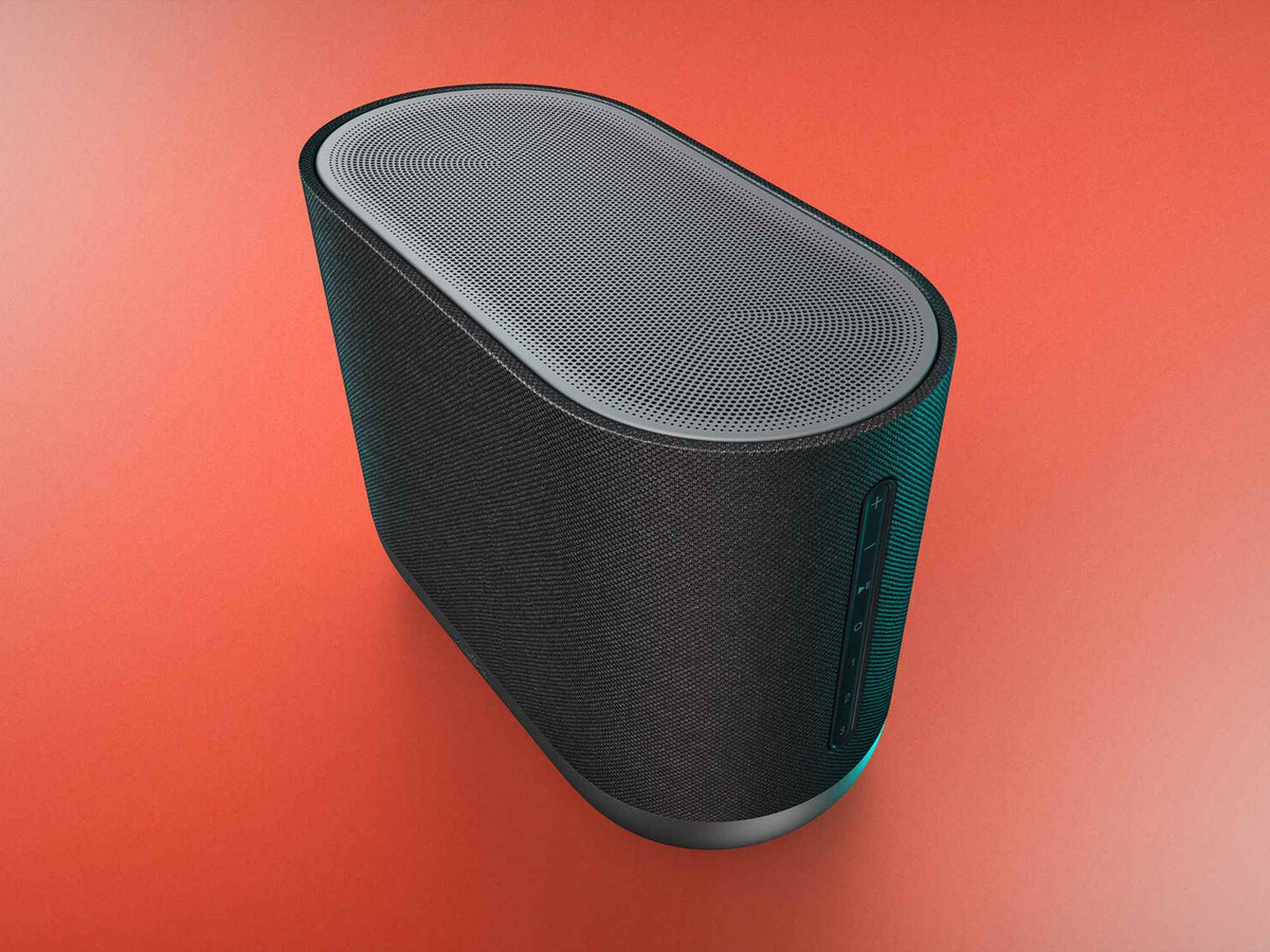 Denon Home 400 belaidė garso kolonėlė, antracito pilka, valdymo pusės vaizdas spalvotame fone