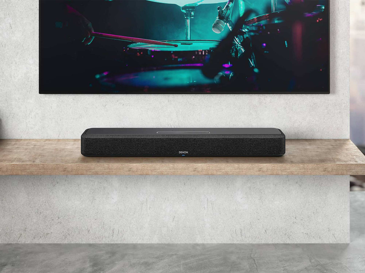 Denon Home Sound Bar 550 sound bar, Black, sound bar on a wall shelf