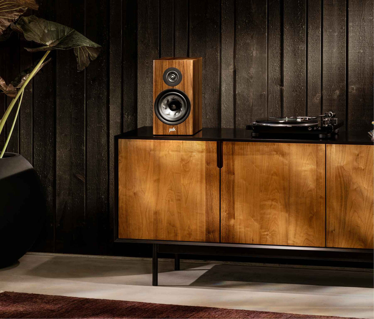 Polk Audio Reserve R200 walnut bookshelf speaker, in a room