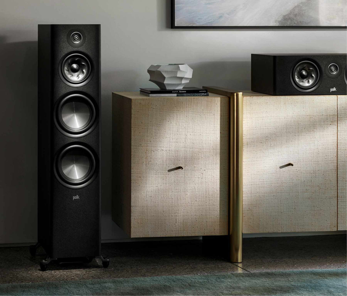 Polk Audio Reserve R700 black floorstanding speaker, in a room