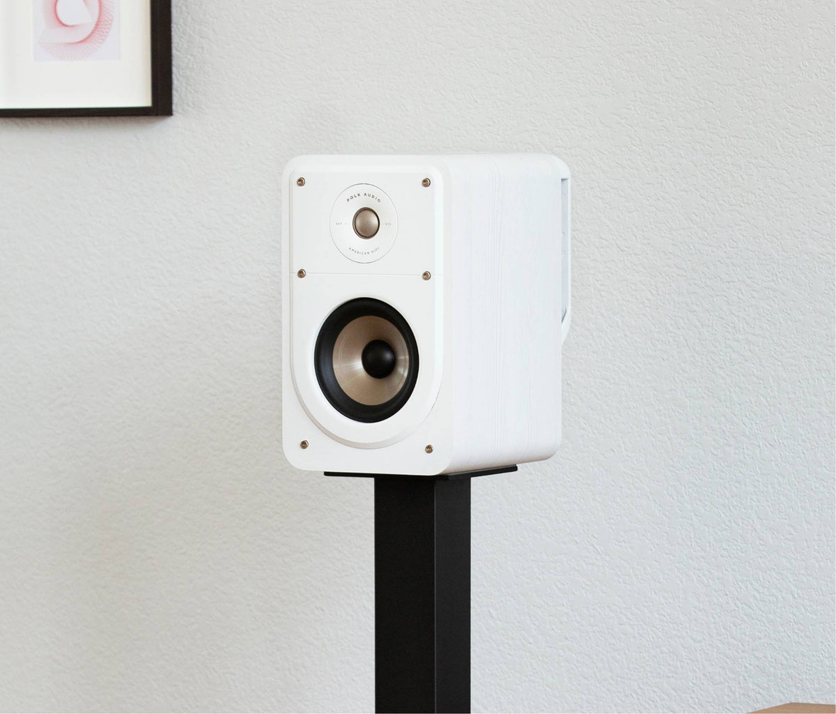 Polk Audio Signature Elite ES15 white bookshelf speakers, in a room