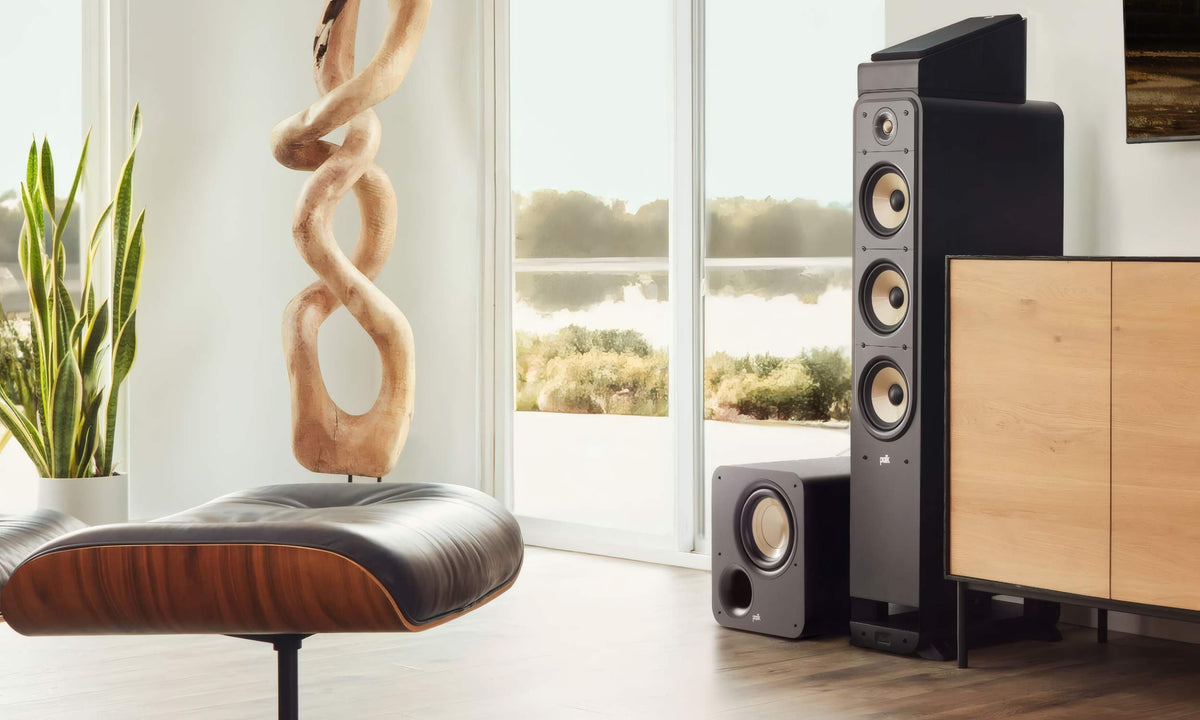 Polk Audio Signature Elite ES8 powered subwoofer, in a stereo system beside a television