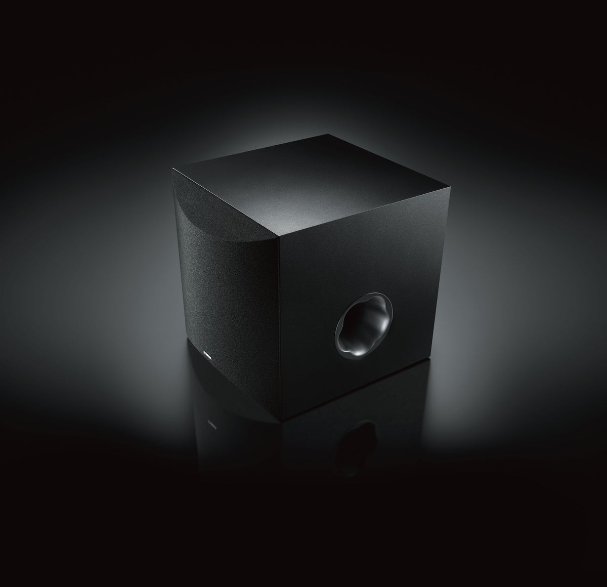 Yamaha NS-SW100 – manufacturer photograph on a dark background